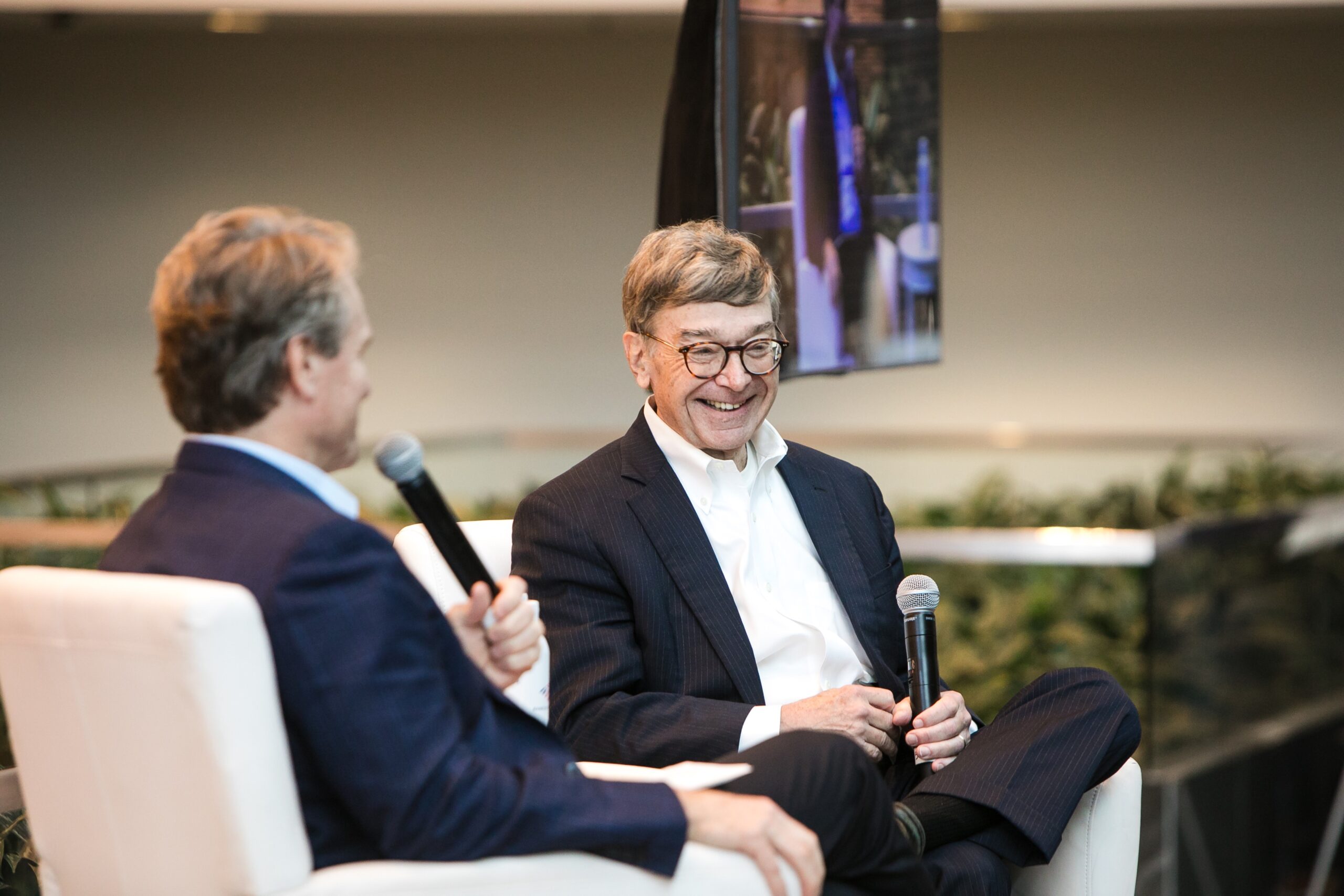 two businessmen conference image with mic