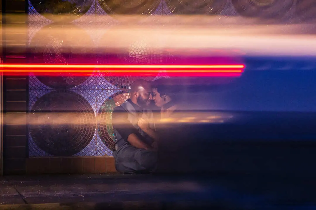 couple image with red and orange light 