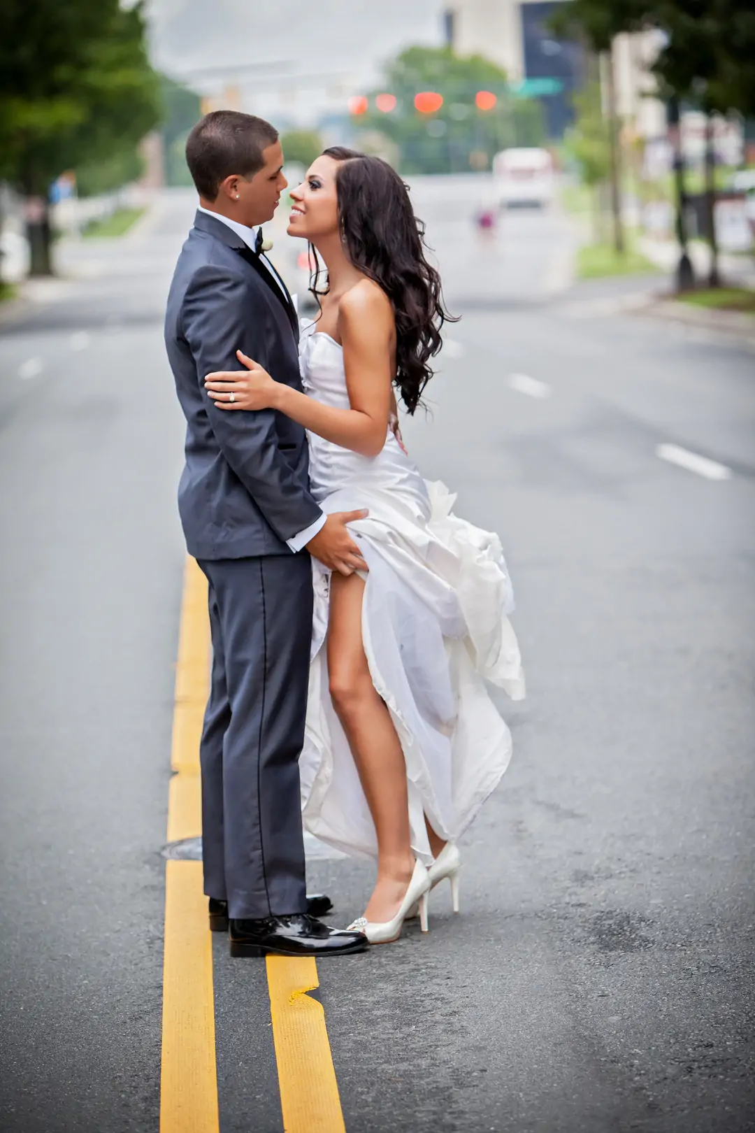 couple wedding pose on the road