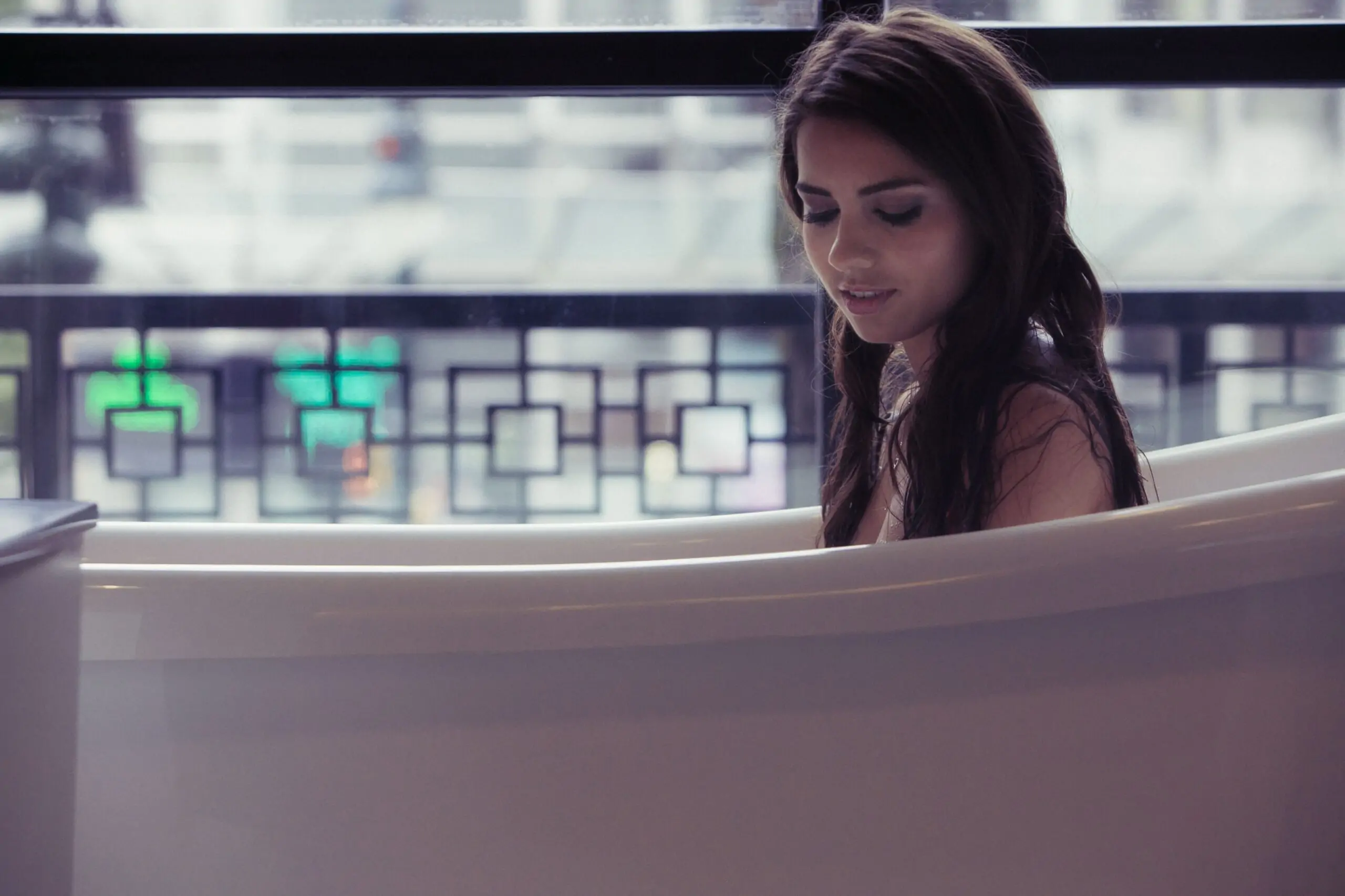 beautiful girl boudoir pose in the bathing tub